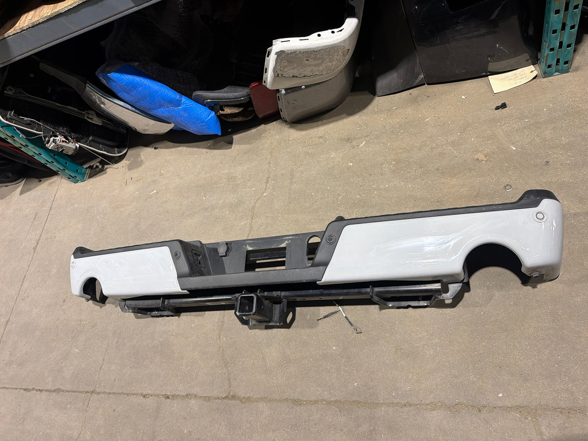 2021 - 2023 FORD F150 OEM PAINTED REAR BUMPER ASSEMBLY OEM USED