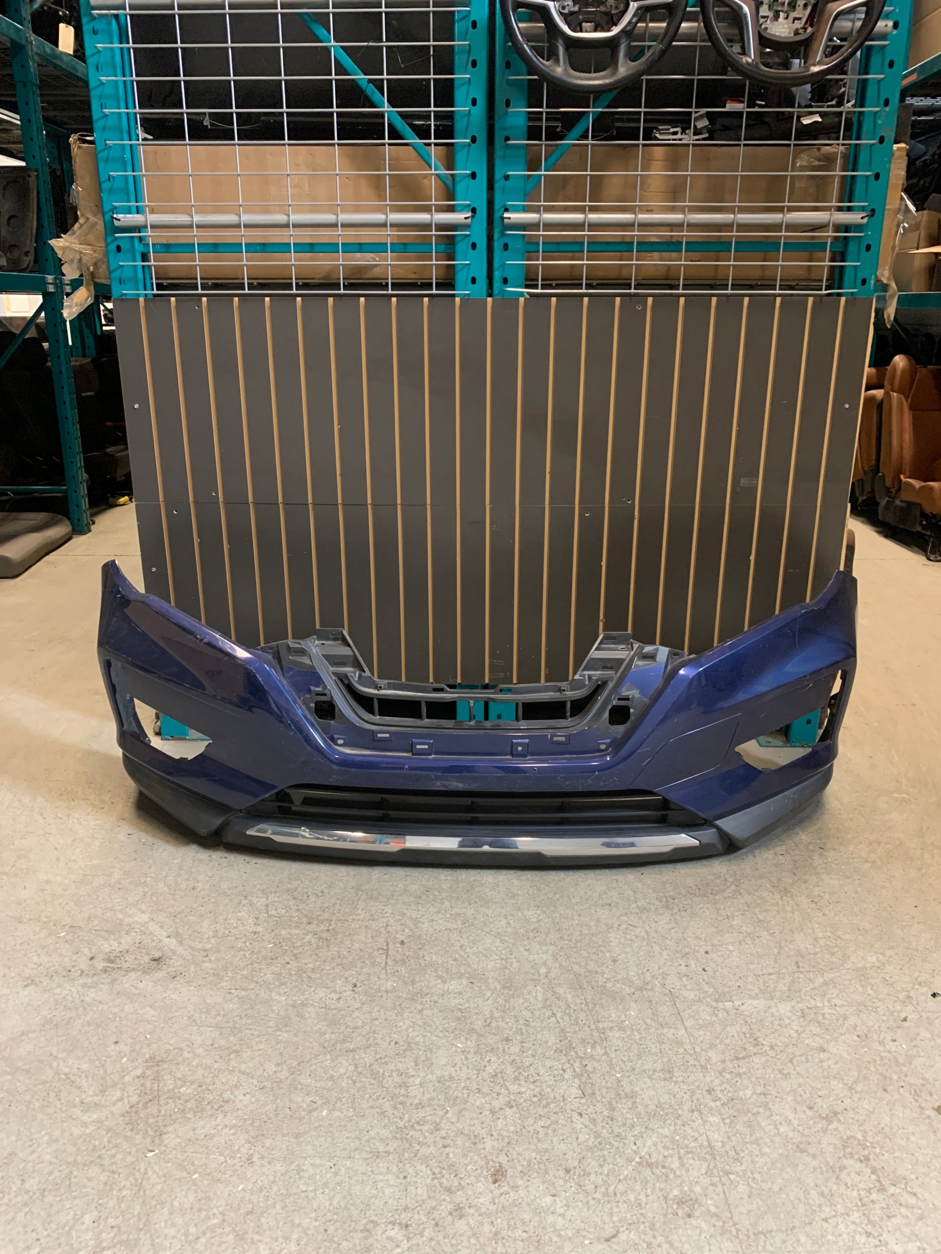 2017 - 2020 NISSAN ROGUE FRONT BUMPER IN BLUE OEM USED