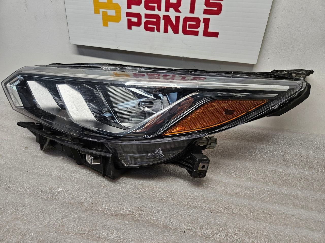 Nissan Headlight Assembly Passenger Side RH OEM